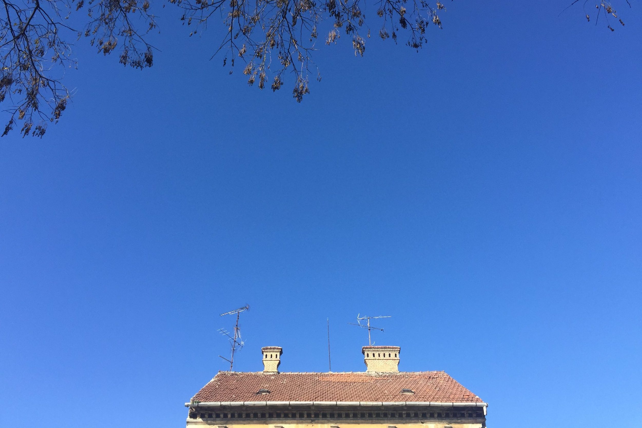 old roof with blue sky